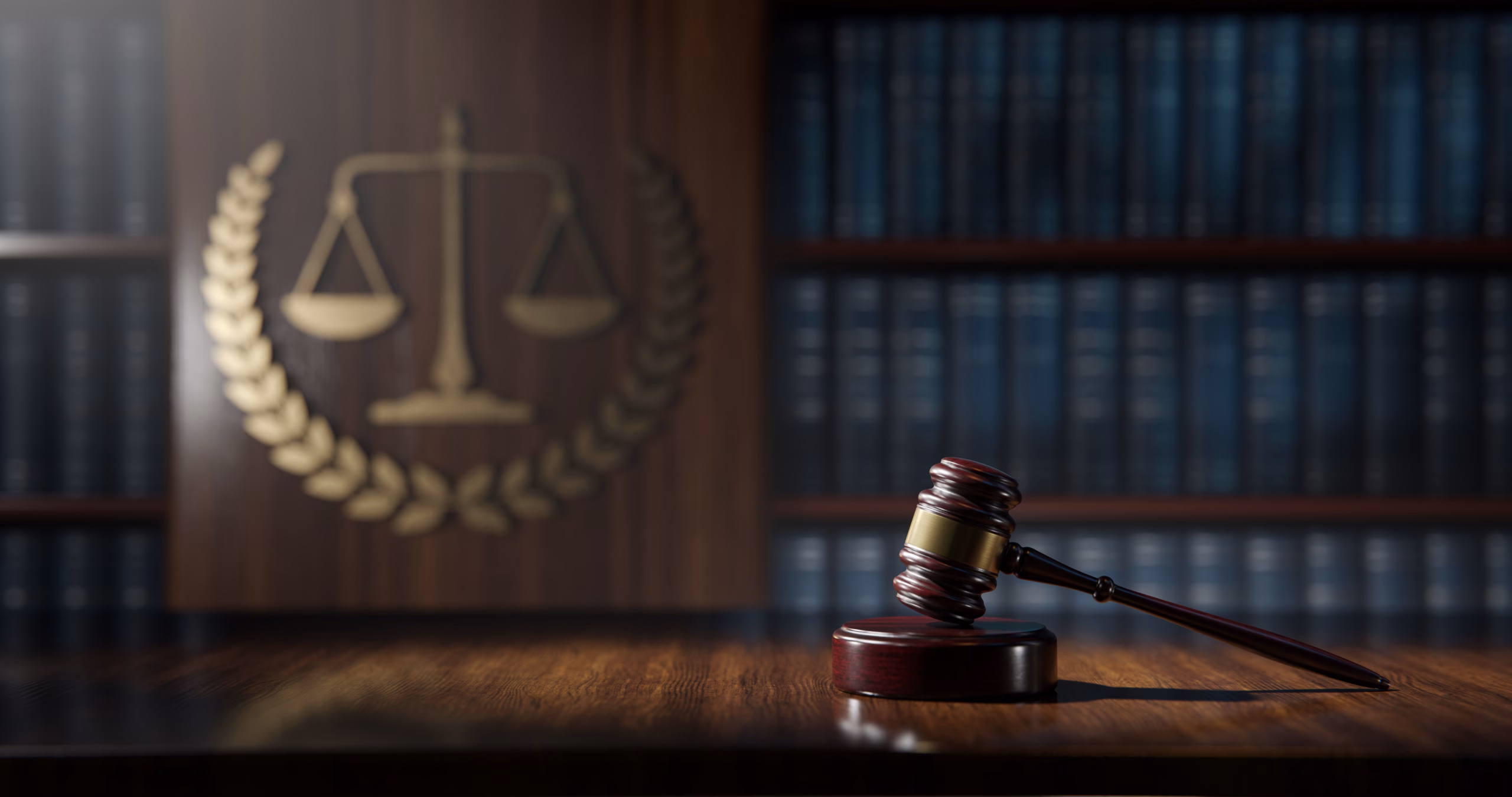 Judge’s gavel and scales of justice on law books, symbolizing Louisiana Supreme Court authority over expert funding for indigent defense
