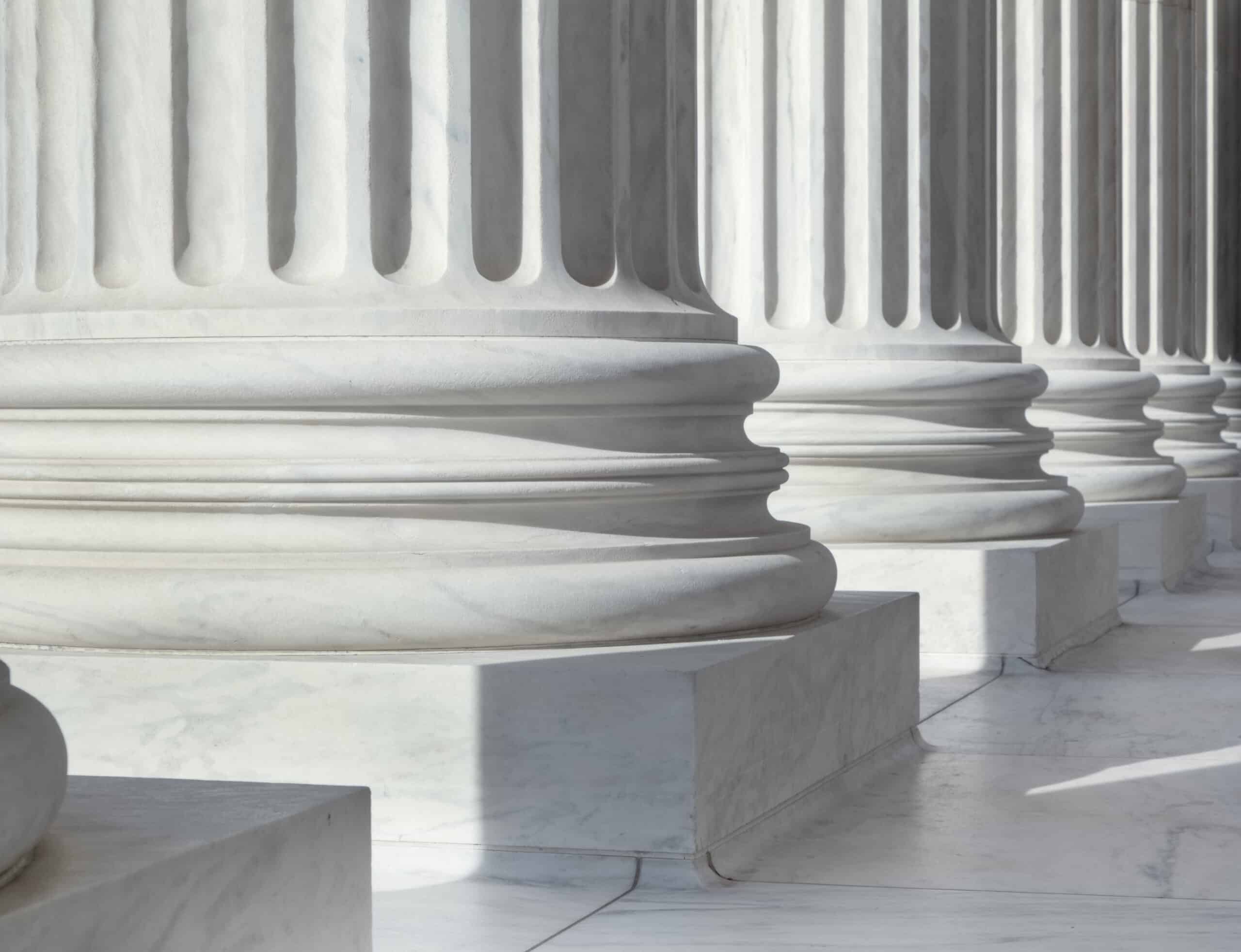 One Act, One Conviction: How Barrett v. United States Limits Stacked Federal Gun Charges 2 U.S. Supreme Court building columns, where Barrett v. United States limited stacked federal gun charges