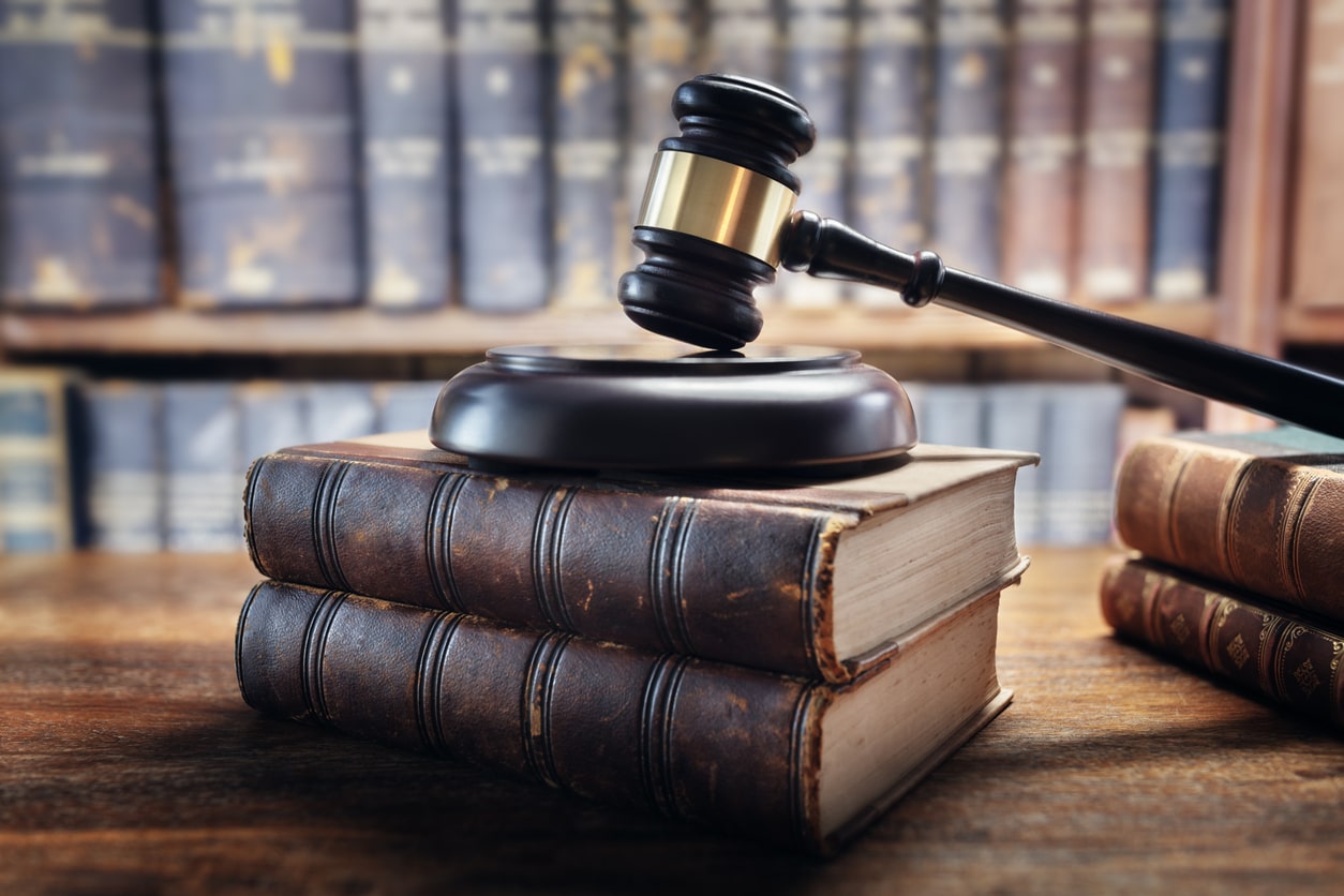 Indecent Behavior with a Juvenile Defense Lawyer in Louisiana 5 Gavel and law books representing Louisiana indecent behavior statute and defense