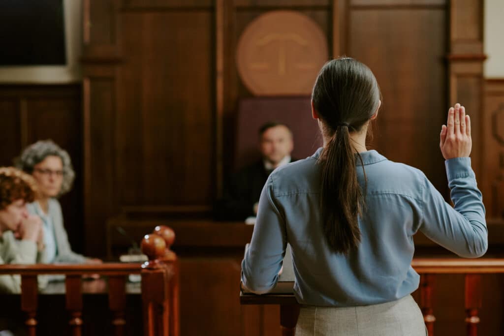 Castle Rock 1 Young Caucasian Woman Testifying in Courtroom during Legal Proceedings